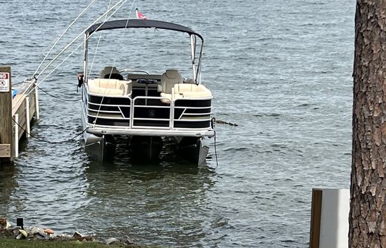 Enjoy beautiful Lake Martin on this like-new 23ft Godfrey Sweetwater