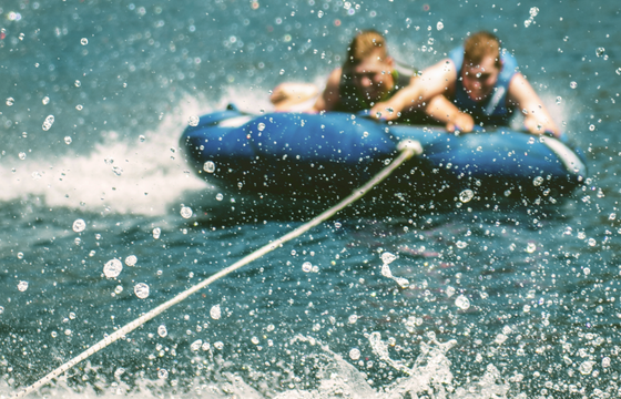 Axis Wake Surf Boat Tubing Experience Perfect For Pups – Lake Austin