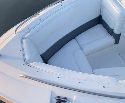 Experience the thrill of wake surfing on a classic 1989 Cobalt