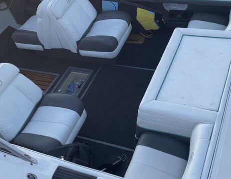 Experience the thrill of wake surfing on a classic 1989 Cobalt