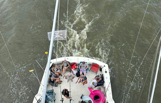 Fun in the sun with one of the largest vessels in middle river.