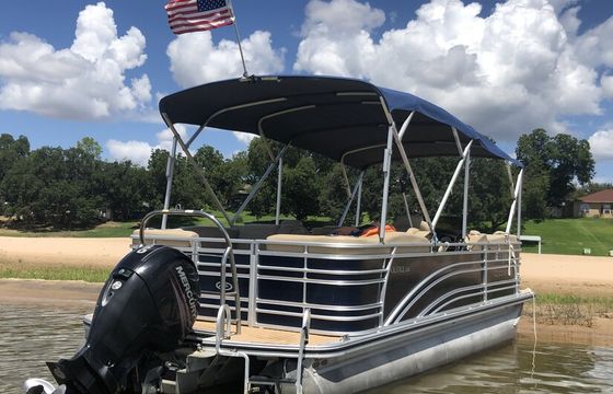 Experience all the fun of  Lake LBJ on this Tri-Toon