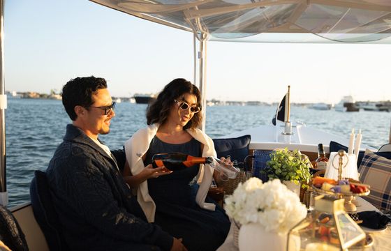 Port & Proper's Luxury Captained Duffy w/ Fire Pit &Styled Tablescape