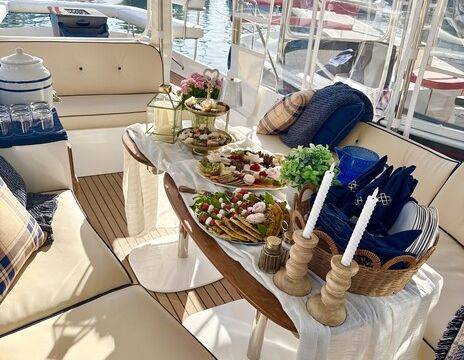 Port & Proper's Luxury Captained Duffy w/ Fire Pit &Styled Tablescape
