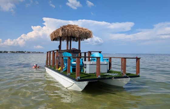 Cruise • Chill • Celebrate on a 20ft Tiki Adventure!