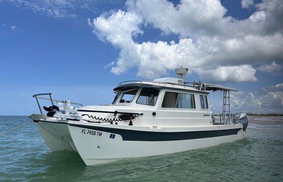 Lil Yachty - 27 foot catamaran cabin cruiser captained by SWFL Native