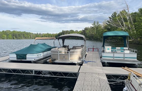 22 ft pontoon fishing boat on semi private lake