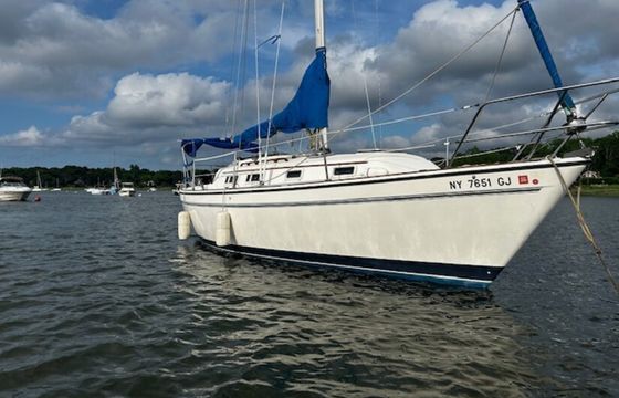 30’ sloop sail boat.