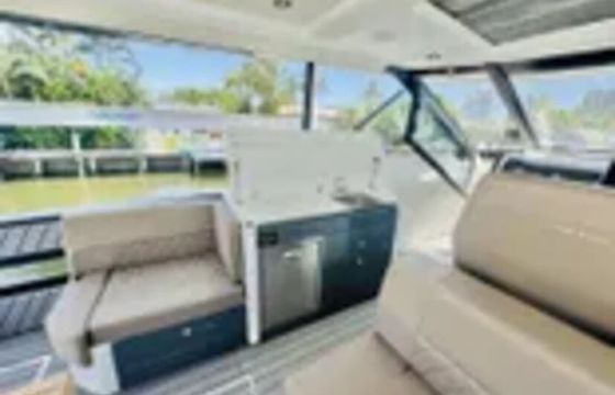 Escape to Lake Erie's Horizon: Charter the Saxdor 400 GTO!