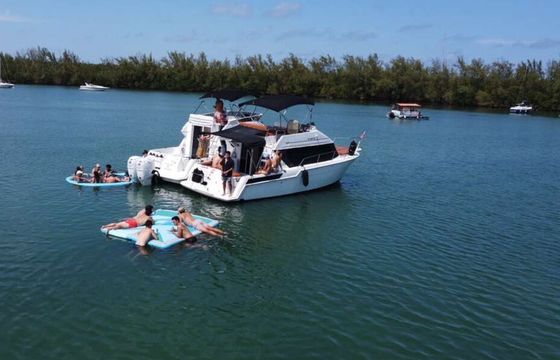 "SPECIAL DISCOUNT WEEKDAYS" FLYBRIDGE CARVER AFT CABIN