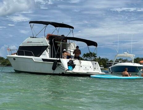 "SPECIAL DISCOUNT WEEKDAYS" FLYBRIDGE CARVER AFT CABIN