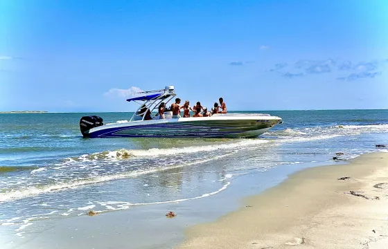 Folly Beach Sunset/Dolphin Lighthouse Cruise - Party Aboard a 32ft Renegade CC