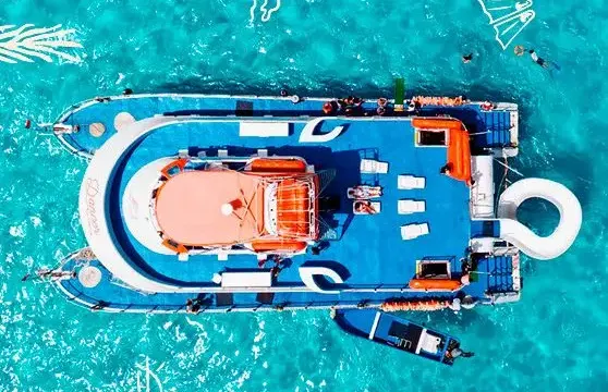 77 ft Catamaran Cruise With Drinks, food and Waterslide In Cancún, Mexico