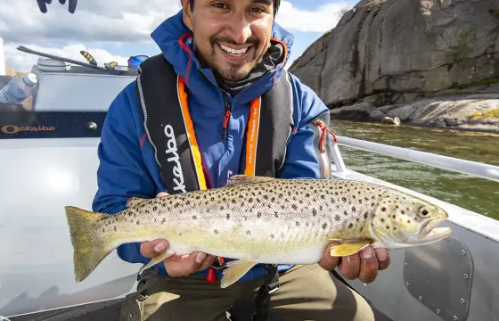 Sea Trout fishing with boat, on shallow waters close to land, near Gothenburg