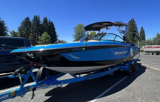 2024 Mastercraft surf boat with captain and gear