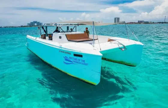 Isla Mujeres Eco Catamaran Experience with Snorkeling & Beach Club