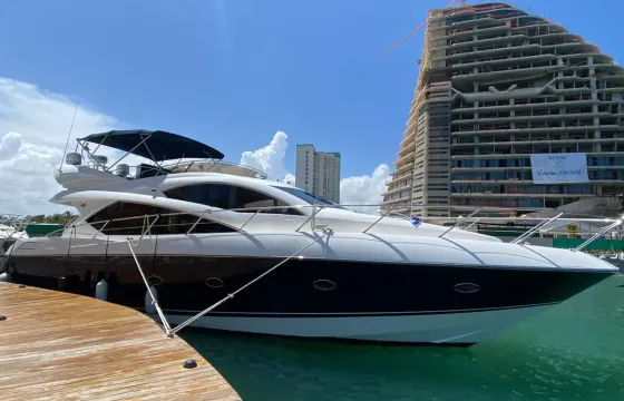Enjoy Cancun and Isla Mujeres in style on 66' Sunseeker Manhattan for 18 people