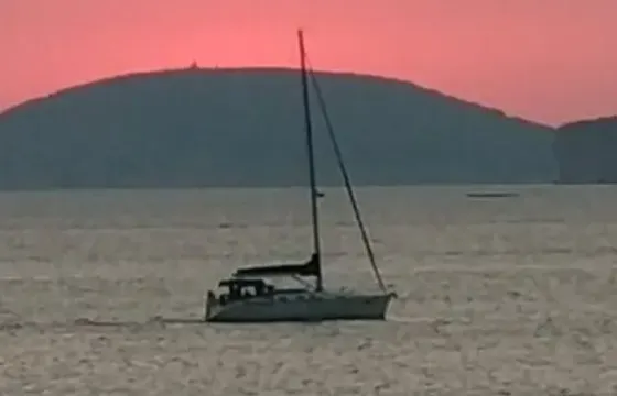 Sail into the Sunset: Mini Sailboat Tour in Alghero with Captain Sergio!