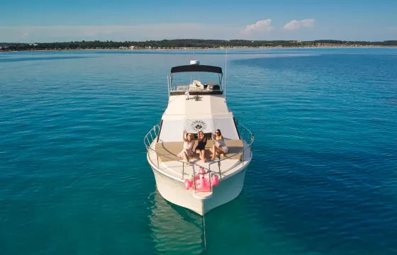 Private Boat Tour In Medulin on a Vintage sport Fishing Boat