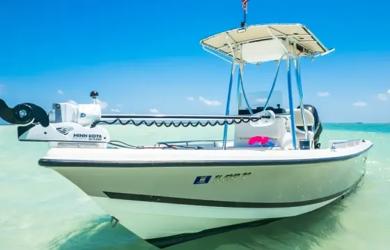 "Piano Piano" Triton 218 Bay Explorer Center Console Rental located in Naples, Florida
