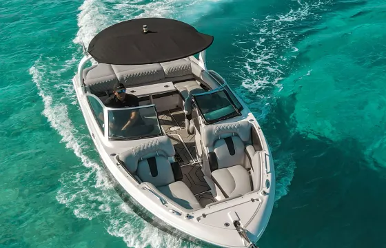 Enjoy Cancun on our 26ft Trick Four Winns Boat