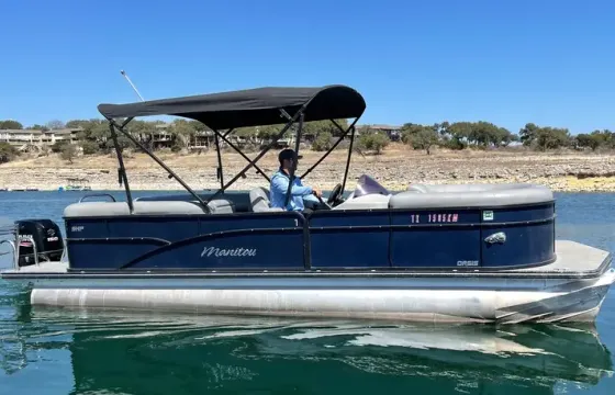 #1 24' Manitou Oasis Deluxe Tritoon on Lake Travis