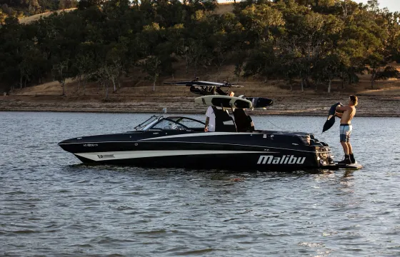 #1 Reviewed Charter Boat! Surf the Dragon on a Malibu M235  wake/surf boat.