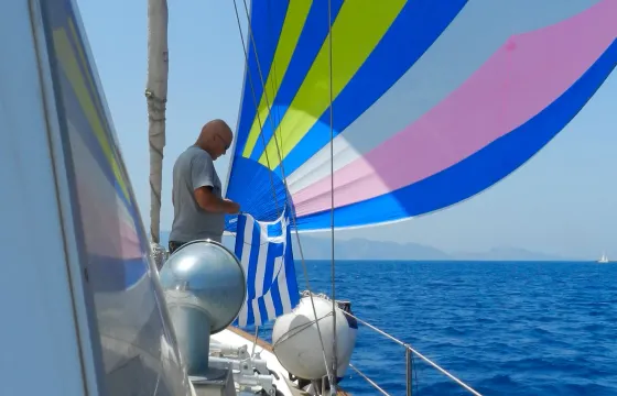 Sail cruising among the Dodecanese islands in Greece