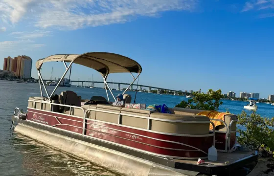24ft Sunchaser Pontoon Boat for a Perfect Day in Peanut Island