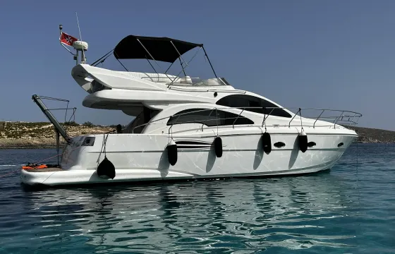 Astondoa 43 FlyBridge Yacht in St. Julian's fit up to 9 people