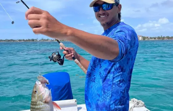 Reef Fishing, Snorkeling and Beach BBQ tour in San Pedro, Belize.