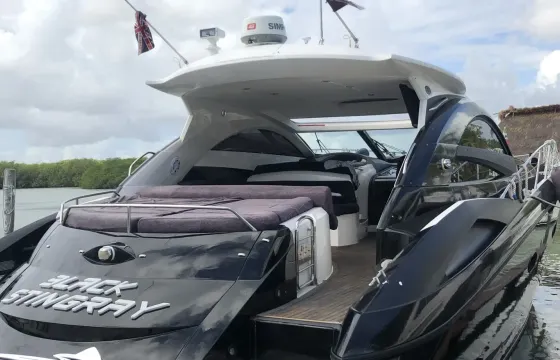 Luxury black Sunseeker 64 Yacht for Charter in Cancún, Mexico