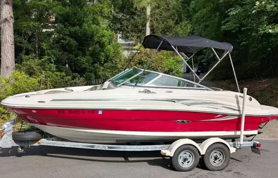 Enjoy the day out on the water, aboard a 21-foot power boat!