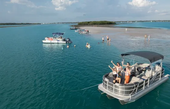 Beautiful 2023 Luxury Tritoon 24' up to 13 people! Tube for 2 included!