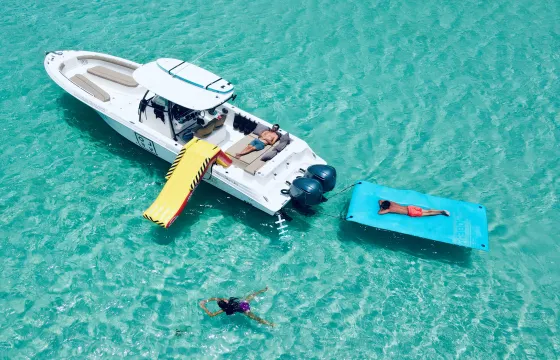 Fun 700Hp 35ft Wellcraft Scarab Boat Charter with Waterslide & Toys