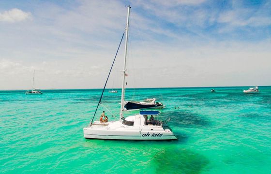 Cheers to the Seas: 37ft Catamaran Charter in Cancún with Open Bar Options!