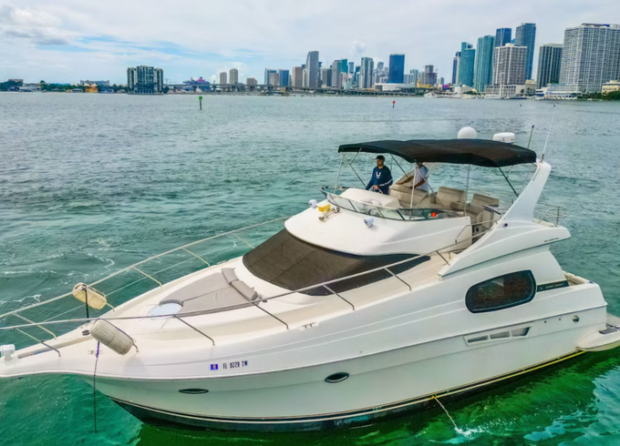 Enjoy "SANTORINI" Silverton Sport Bridge 48ft in Miami!