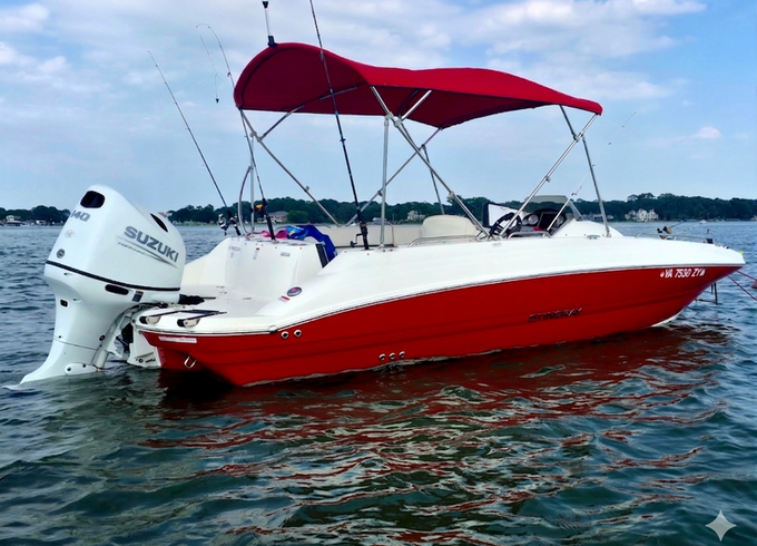Beautiful 20ft Boat with front and rear deck and bimini cover