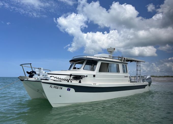 Lil Yachty - 27 foot catamaran cabin cruiser captained by SWFL Native
