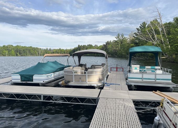 22 ft pontoon fishing boat on semi private lake
