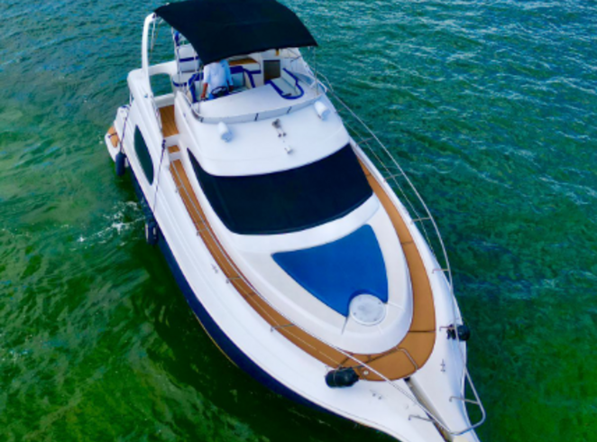 Enjoy “OTTAWA” Silverton Flybridge 48ft Luxury Yacht in Miami!