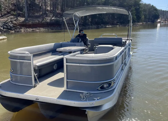 Enjoy a beautiful day on Lake Norman with a 23ft Luxury Tri-toon and free tube!