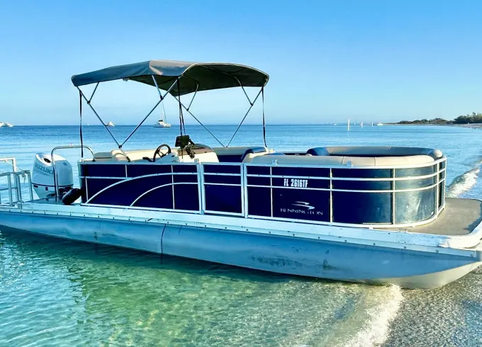 24' Tritoon Bennington with 175 Hp Suzuki outboard for rent in Holmes Beach!
