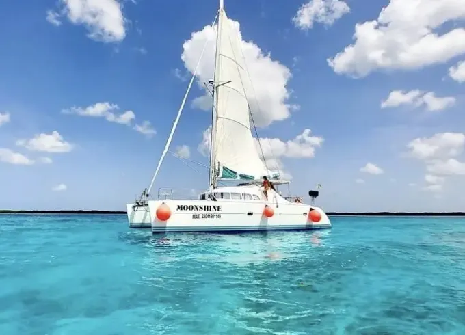 Visit Isla Pasión in 45ft Lagoon Catamarán tour. (Shared tour)
