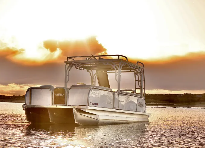 Double Decker Tritoon with Slide in Lake Travis.