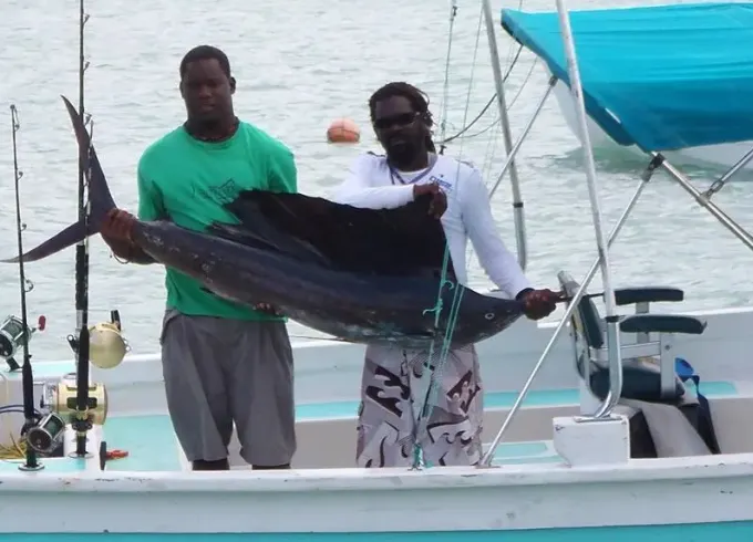 Boat Tours & Fishing Charters on a 28ft Pirogue Boat in Buccoo, Tobago