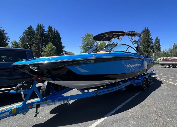 2024 Mastercraft surf boat with captain and gear