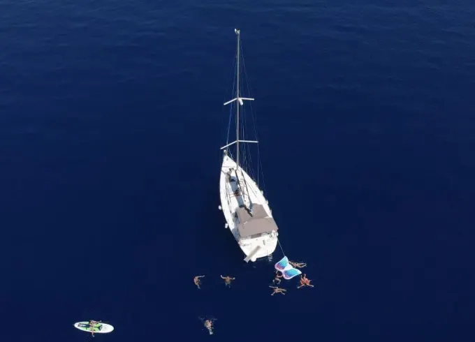 Fun in the Sun: 2.5-Hour Sailing, Inflatables, and Swimming Tour of Barcelona