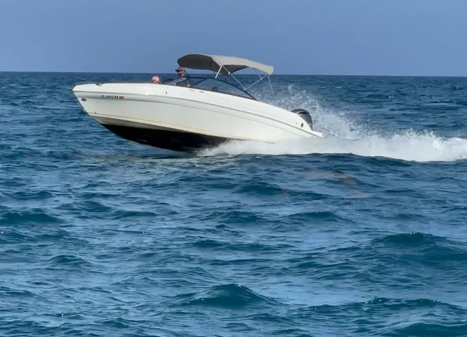 Set Sail in Style: 23ft Rinker Q3 Bowrider for 12 People in Hollywood Beach FL
