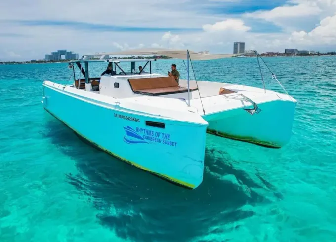 Isla Mujeres Eco Catamaran Experience with Snorkeling & Beach Club